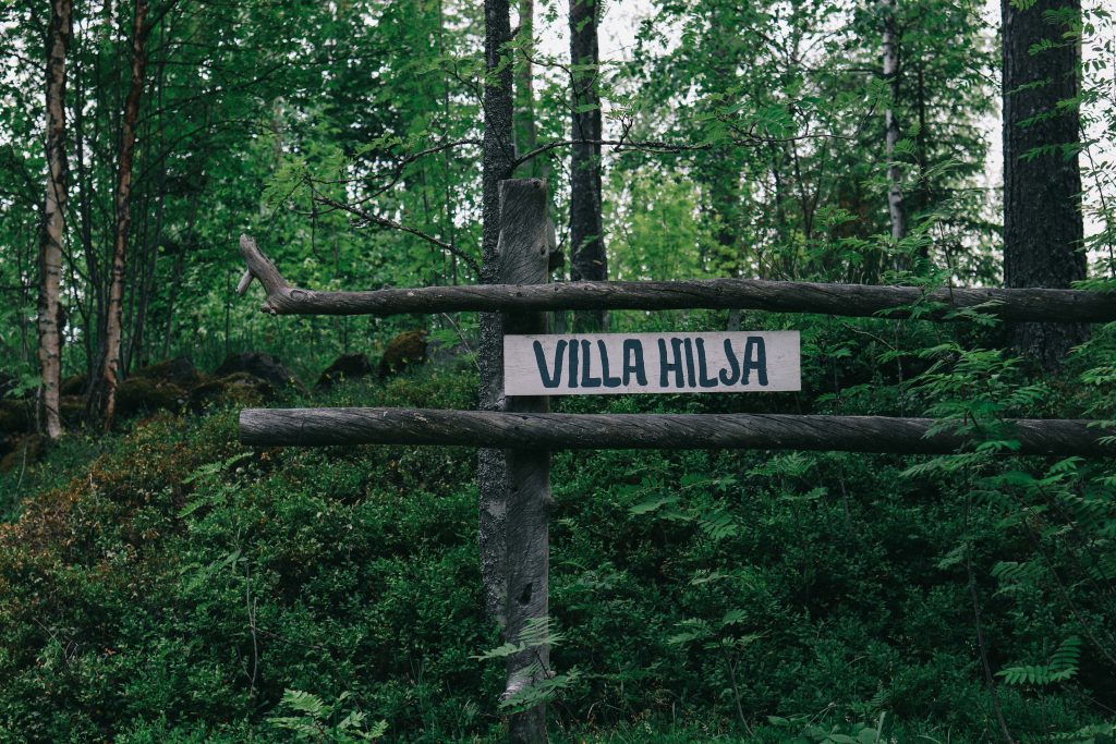 A sign reading 'Villa Hilsa' found next to the Finnish lakelands.